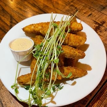 Plate of Deep Fried Pickles, one of the specials offered at Tavern 1883 in Canmore, Alberta.