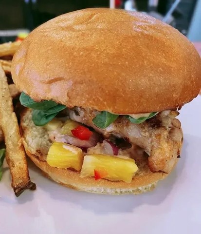 Chicken Burger with pineapple salsa - the Thursday dining special at Mineshaft Tavern in Canmore, Alberta