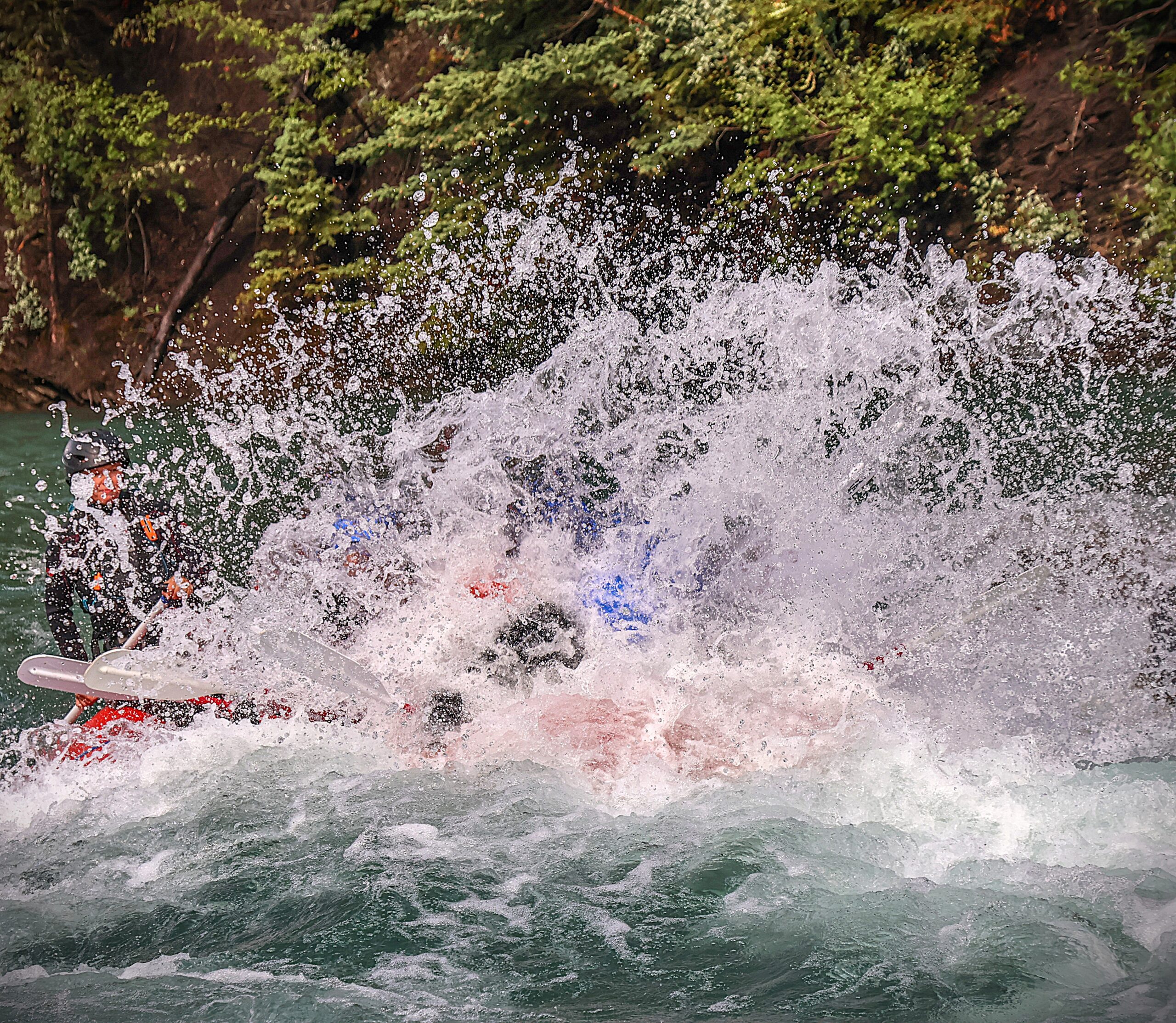 Big Splash while whitewater rafting on the Kananaskis River with Canadian Rockies Rafting