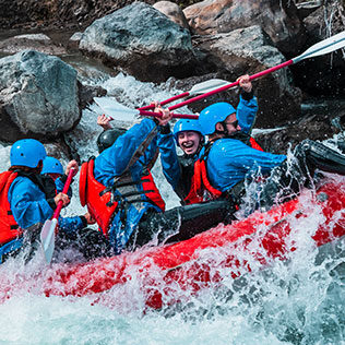 A group enjoying the thrill of whitewater rafting